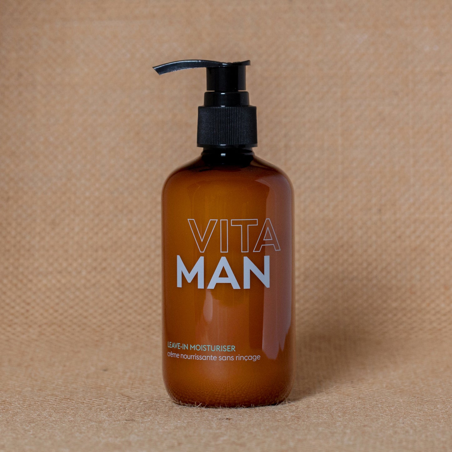 Hair frizz control leave‑in treatment with Australian botanicals