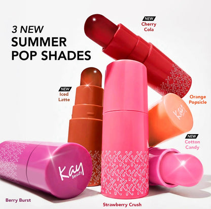 Colorful lipsticks with 'Kay Beauty' branding on a white background, featuring '3 New Summer Pop Shades'.